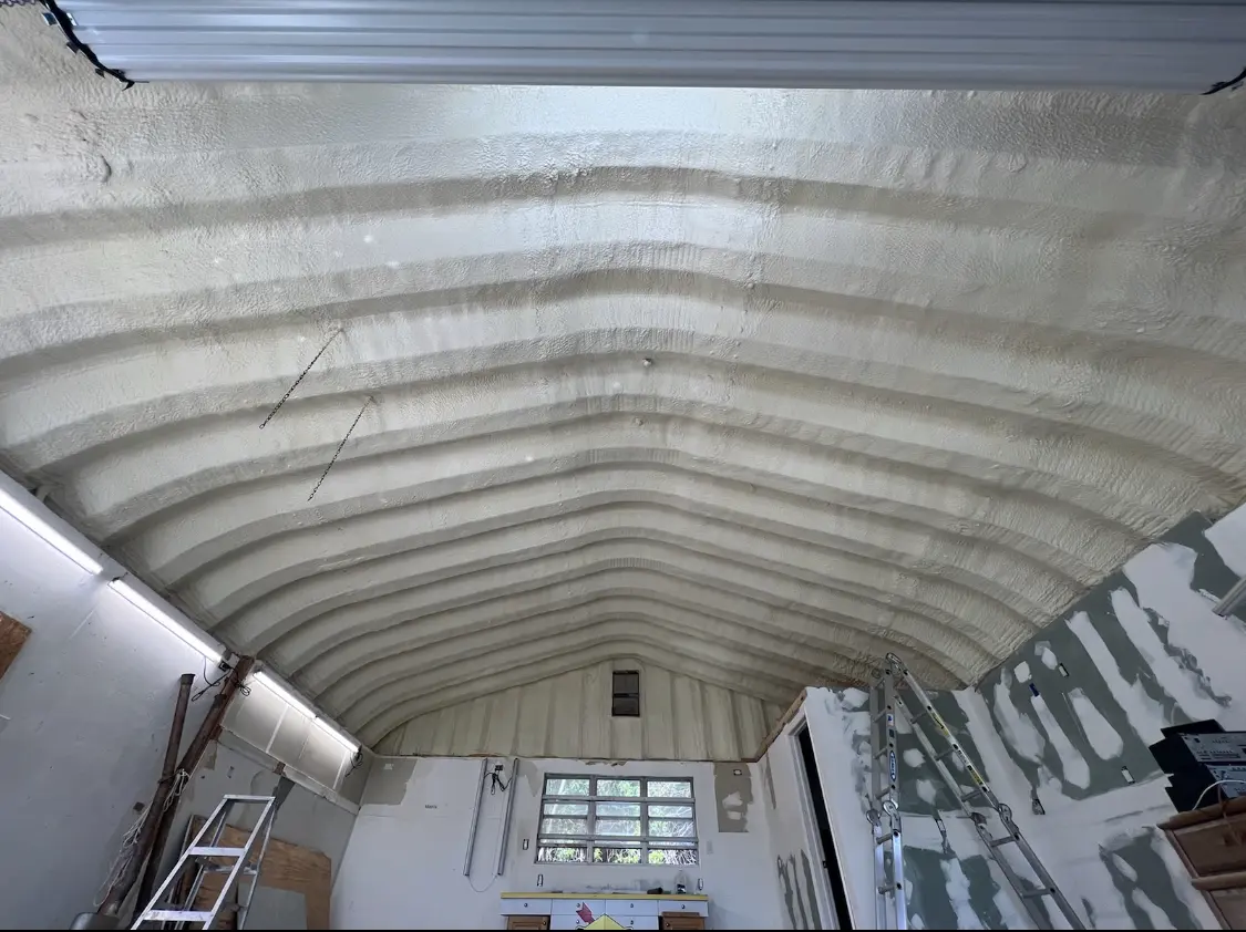 Spray polyurethane foam applied to the underside of a metal roof deck in Midland Park